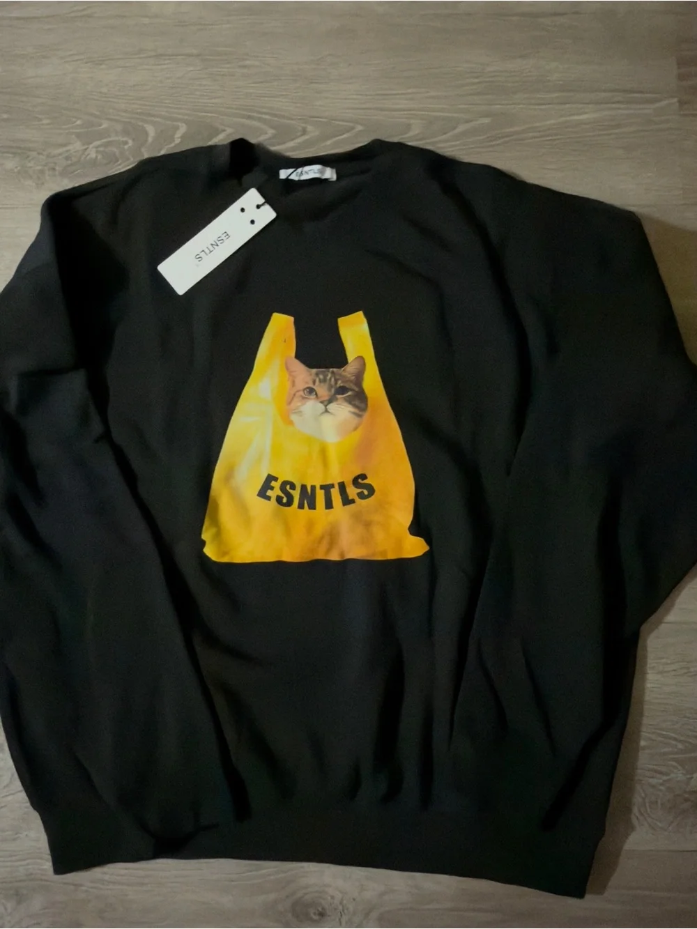 ESNTLS Black Sweatshirt with Yellow Cat Bag Graphic